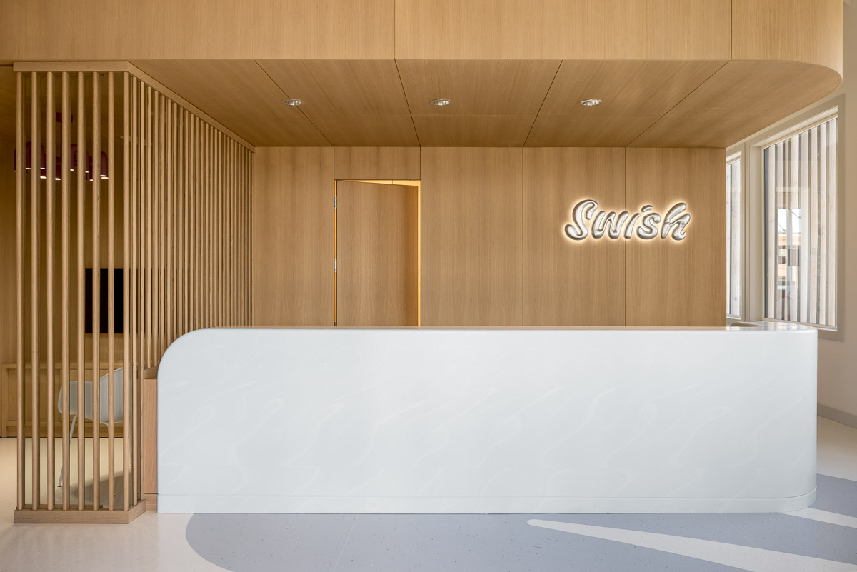 The front desk area of Swish Oral Care, a dental clinic in Calgary